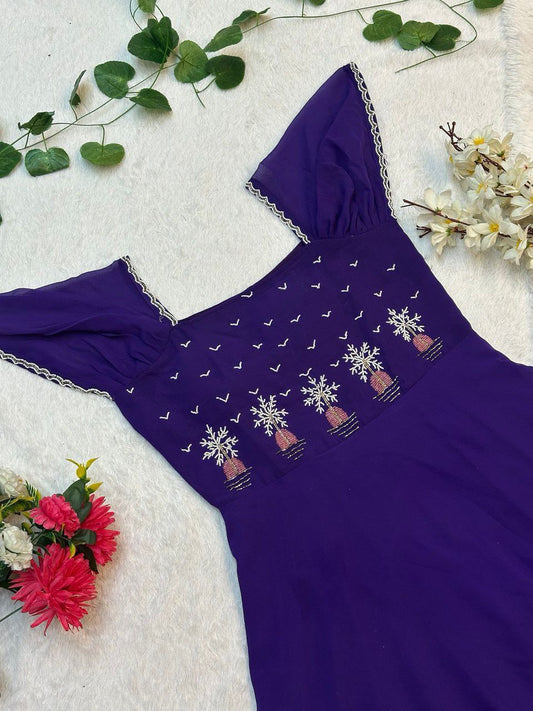 Georgatte gown with intricate handwork exudes traditional charm, perfect for any occasion